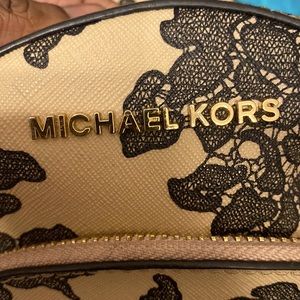 Black and pink Micheal kors bookbag